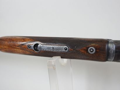 MIROKU brand shotgun with stacked 20 gauge...