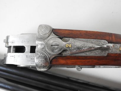 Belle paire de fusils à platines de marque...