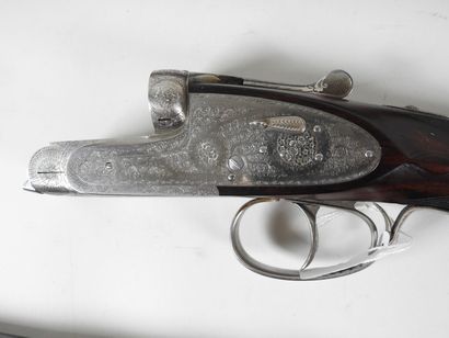 Belle paire de fusils à platines de marque...