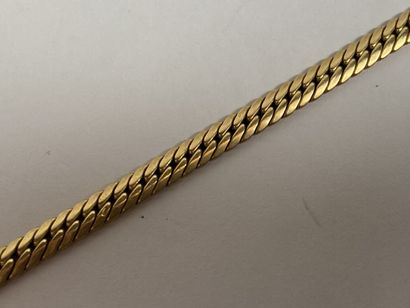 Bracelet in 18K yellow gold with flattened...