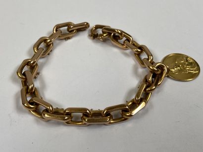 Important 18K yellow gold bracelet holding...