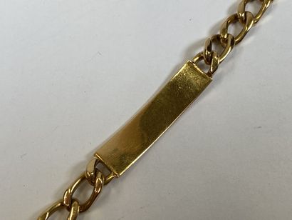 18K yellow gold bracelet or curb chain adorned...