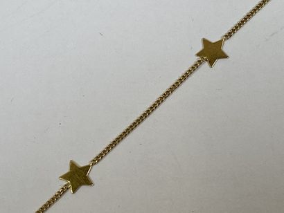 Bracelet in 18K yellow gold with small stars.

Weight...