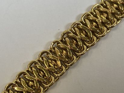Bracelet in 18K yellow gold with flattened...