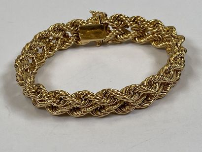 Bracelet in 18K yellow gold with twisted...