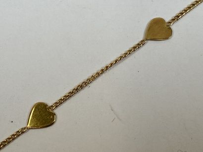 Bracelet in 18K yellow gold with small hearts.

Weight...