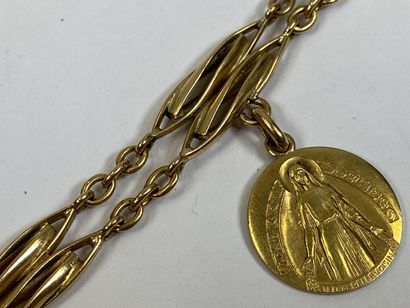18K yellow gold chain transformed into a...