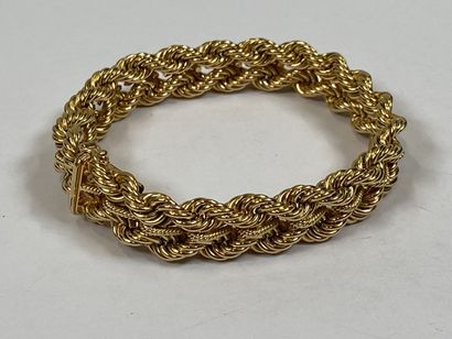 Bracelet in 18K yellow gold with twisted...