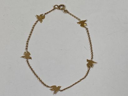 Bracelet in 18K yellow gold with small stylized...
