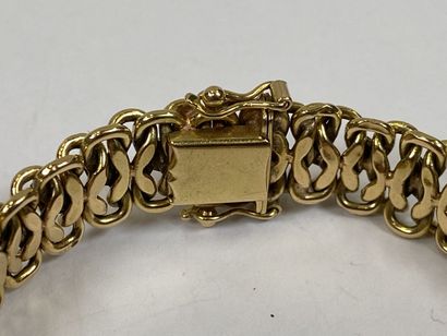 Bracelet in 18K yellow gold with flattened...