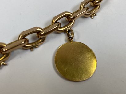 Important 18K yellow gold bracelet holding...