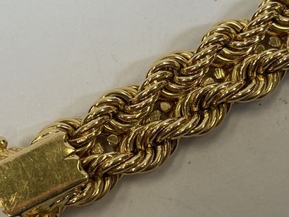 Bracelet in 18K yellow gold with twisted...