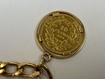 18K yellow gold bracelet or curb chain adorned...