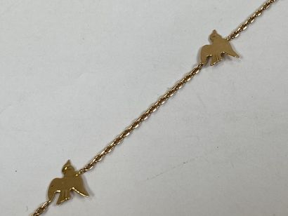 Bracelet in 18K yellow gold with small stylized...