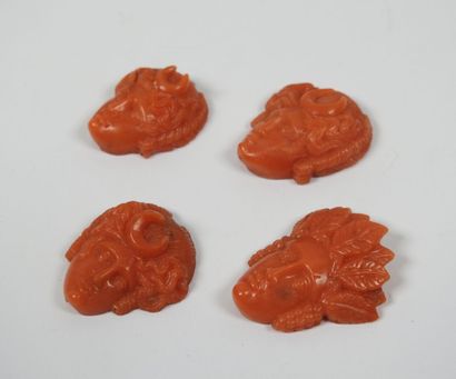 Four ornamental elements in carved coral...