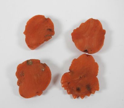 Four ornamental elements in carved coral...