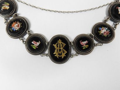 Silver bracelet with eight circular or oval...