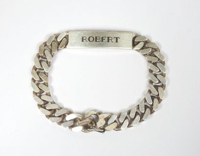 Gourmette patronymique d'homme en argent...