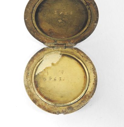 Reliquary circular photo holder mounted as...