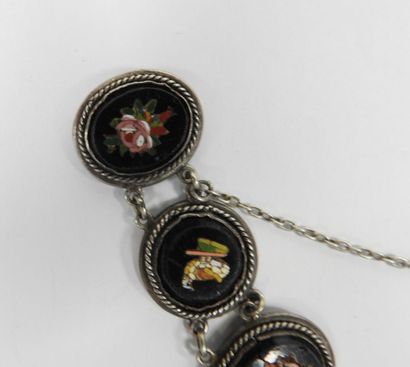 Silver bracelet with eight circular or oval...