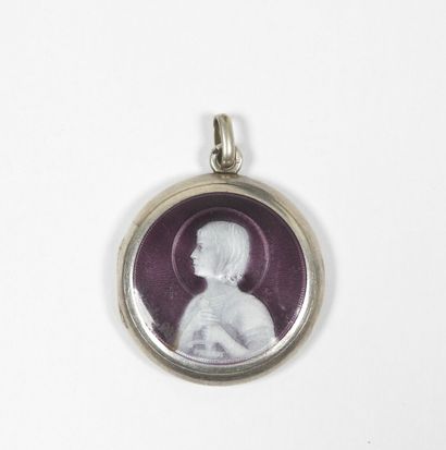 Circular religious medal mounted in pendant...