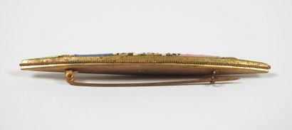Brooch of navette form in gilded metal decorated...