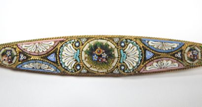 Brooch of navette form in gilded metal decorated...