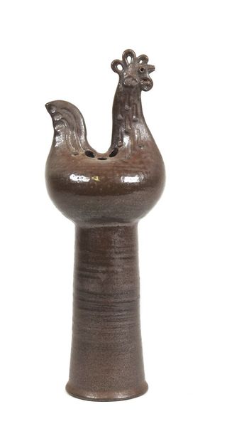 École XXe. 
Vase en céramique marron à décor...