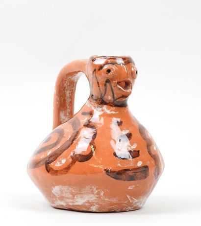 Petit pichet en céramique à glaçure orange...