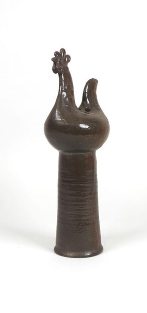 École XXe. 
Vase en céramique marron à décor...