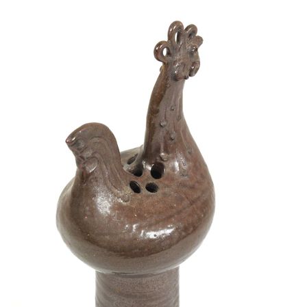 École XXe. 
Vase en céramique marron à décor...