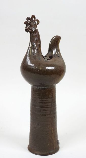 École XXe. 
Vase en céramique marron à décor...