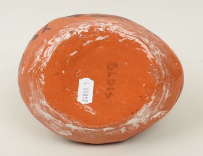 Petit pichet en céramique à glaçure orange...