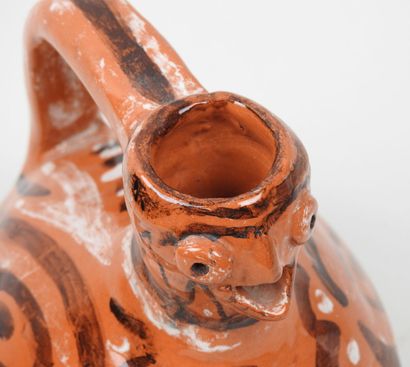 Petit pichet en céramique à glaçure orange...
