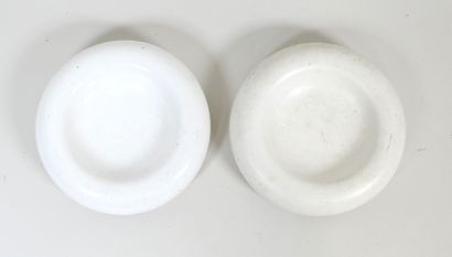 Deux petits vides poches de forme circulaire...