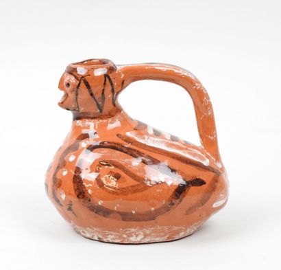 Petit pichet en céramique à glaçure orange...