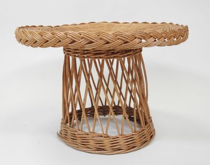 Table basse circulaire en rotin tressée....
