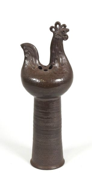 École XXe. 
Vase en céramique marron à décor...