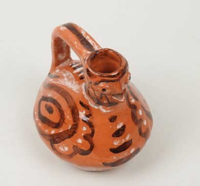 Petit pichet en céramique à glaçure orange...