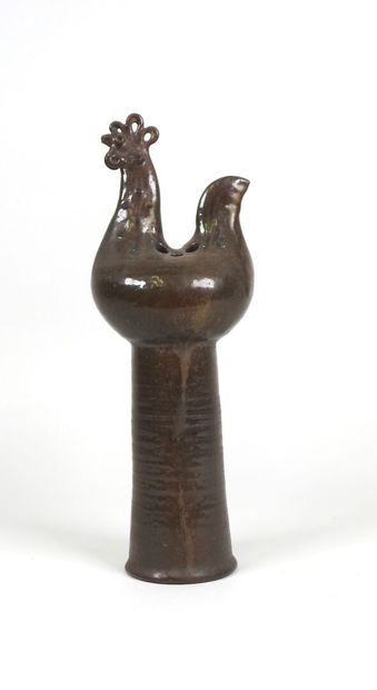 École XXe. 
Vase en céramique marron à décor...