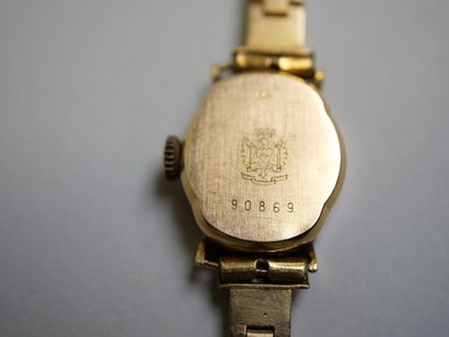 LIP.
Gold ladies' watch on plated bracelet...