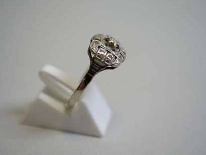 2 gold rings, one in white gold with diamonds...