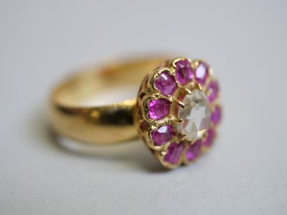 Gold diamond ring set with pink stones**...