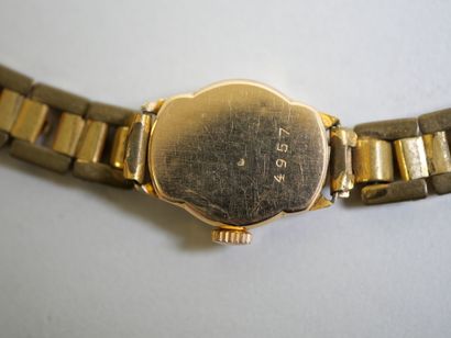 LIP.
Gold ladies' watch on metal bracelet
C...