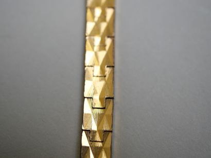 LIP.
Gold ladies' watch on plated bracelet...