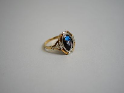 Gold enamel ring with TDD 57 motif.
C 2.88...