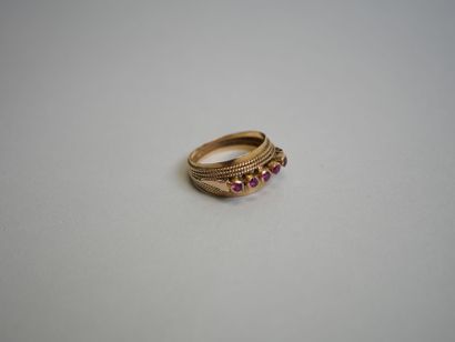 Gold ring with red stones** TDD 53.
AC 3.03...