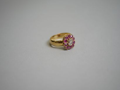 Gold diamond ring set with pink stones**...