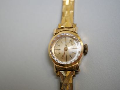 LIP.
Gold ladies' watch on plated bracelet...