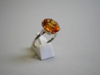 Oval white gold stone** ring TDD 53.
3,18...
